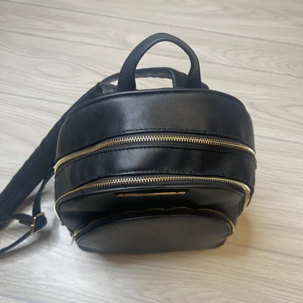 Marc New York By Andrew Marc Black Gold Zip BackPack Faux Leather
